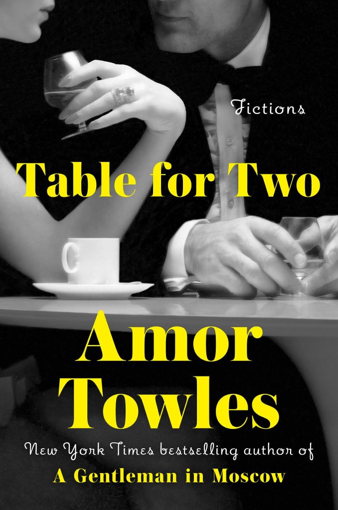 Book cover. Black and white photo of a man and woman sitting at a table, close up so we don't see all of them. They are both holding wine glasses and a small cup and saucer sit on the table. Title: Table for Two by Amor Towles
